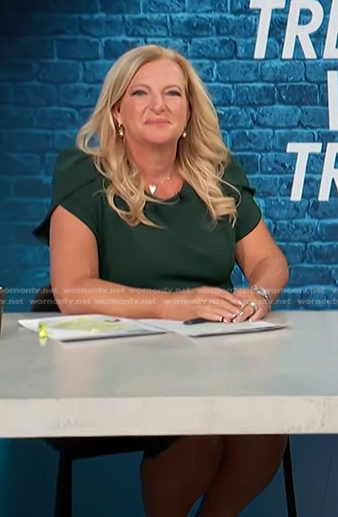 Alison Triessl’s green puff sleeve dress on Access Hollywood
