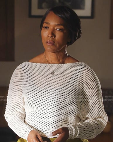 Athena’s white open knit sweater on 9-1-1