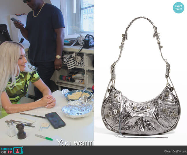 Balenciaga Le Cagole XS Shoulder Bag Metallized worn by Kim Kardashian (Kim Kardashian) on The Kardashians