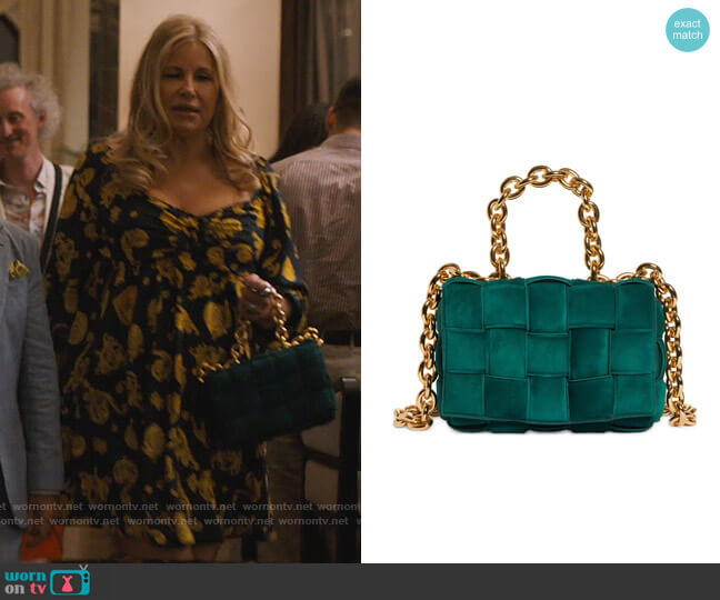 Bottega Veneta Chain Cassette Suede Crossbody Bag in Emerald Green worn by Tanya McQuoid (Jennifer Coolidge) on The White Lotus