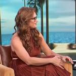 Brooke Shields’s brown satin pleated dress on Access Hollywood