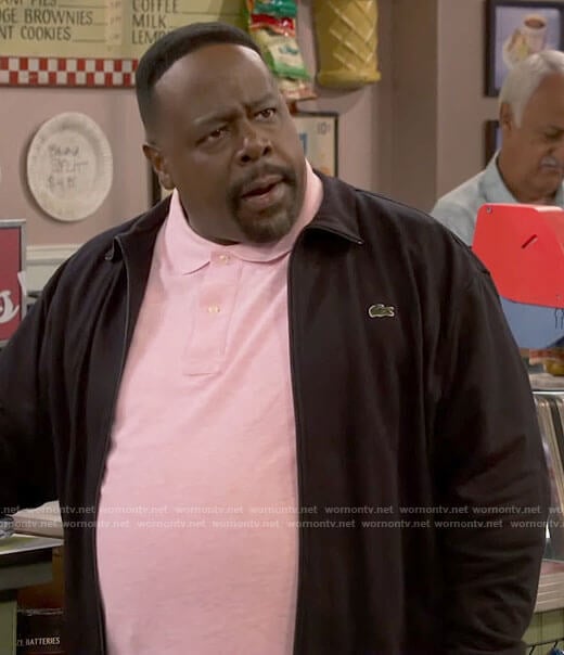 Calvin’s black zip up jacket on The Neighborhood