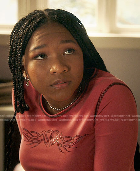 Delilah’s pink heart tattoo top on The Equalizer