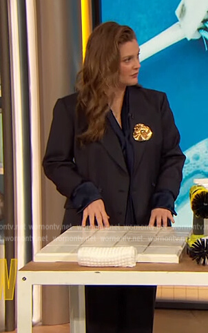 Drew’s navy tie neck blouse on The Drew Barrymore Show