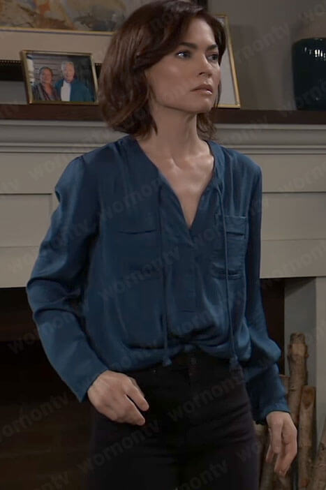 Elizabeth’s teal blue tie neck top with pockets on General Hospital