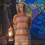 Enid’s orange and pink stripe sweater and floral crochet skirt on Wednesday