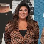 Jennifer’s brown animal print blazer and pants on Access Hollywood