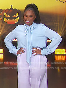 Jennifer’s lavender pants and tie neck blouse on The Jennifer Hudson Show