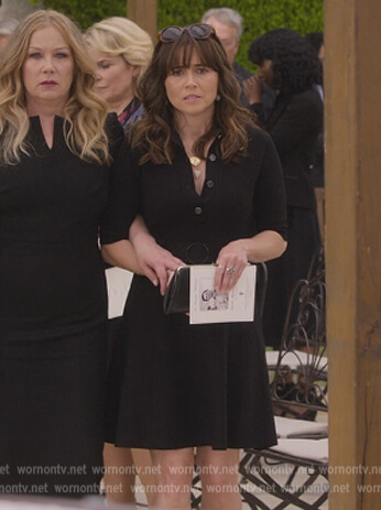 Judy’s black mini polo dress on Dead to Me