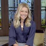 Kelly’s navy blouse and grey pencil skirt on Live with Kelly and Ryan