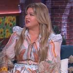 Kelly’s print blouse and mini skirt on The Kelly Clarkson Show