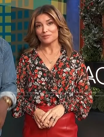 Kit’s black floral ruffle top on Access Hollywood