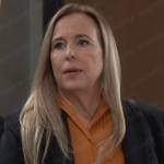 Laura’s orange pleated top and black blazer on General Hospital