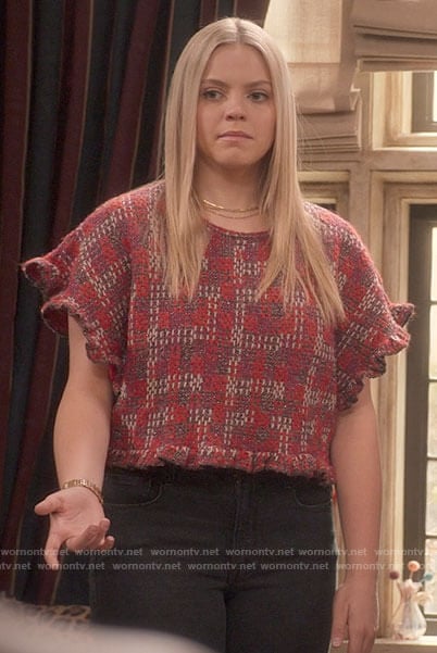 Leighton’s red ruffle trim knit top on The Sex Lives of College Girls