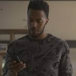 Lewis’s gray abstract print sweater on Reasonable Doubt