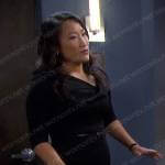 Melinda’s black asymmetric neck dress on Days of our Lives