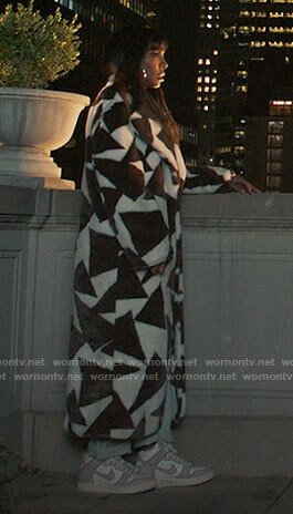Misty’s long geometric coat on The Equalizer