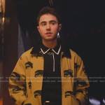 Nico’s beige eye print bomber jacket on Elite