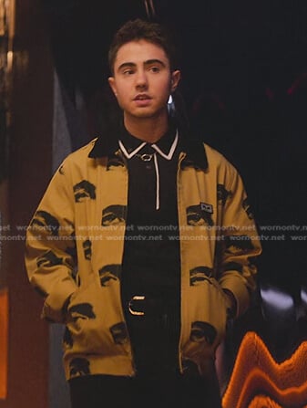 Nico’s beige eye print bomber jacket on Elite