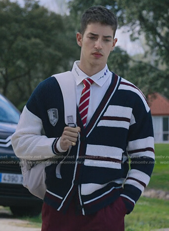 Patric’s white print collar shirt and varsity cardigan on Elite
