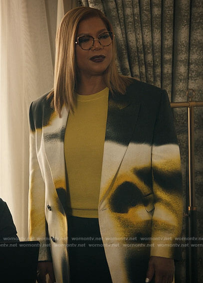 Robyn’s abstract print blazer and twisted earrings on The Equalizer