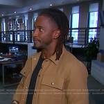 Scott’s beige button jacket on Access Hollywood