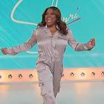 Sherri’s silver metallic jumpsuit on Sherri