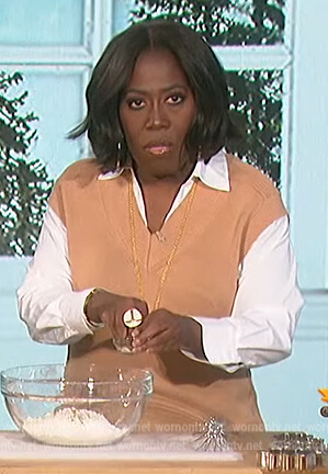 Sheryl’s beige layered sweater on The Talk