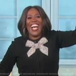 Sheryl’s black bow embellished cardigan on The Talk