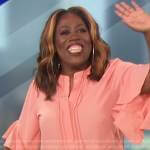 Sheryl’s coral ruffle sleeve blouse on The Talk