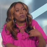 Sheryl’s pink tassel tie top on The Talk