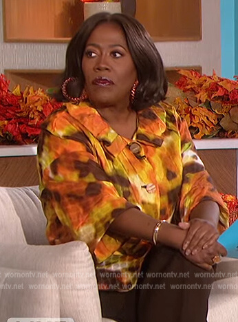 Sheryl’s tie dye print jacket on The Talk