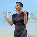 Tamron’s black satin mini dress on Tamron Hall Show
