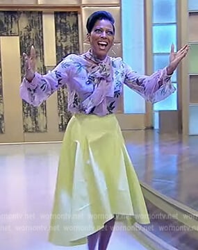 Tamron’s floral print blouse and skirt on Tamron Hall Show
