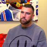 Travis’s grey smiley face sweatshirt on Today