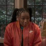 Whitney’s long orange Nike bomber jacket on The Sex Lives of College Girls