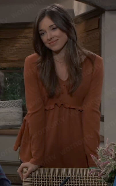 Willow’s orange ruffle trim maternity top on General Hospital