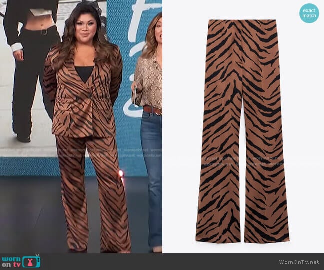 Zara Animal Print Flared Pants worn by Jennifer Chan on Access Hollywood