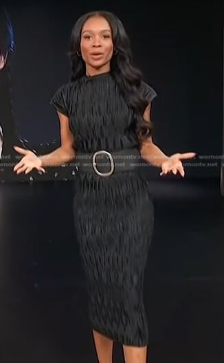 Zuri’s black pleated top and skirt on Access Hollywood