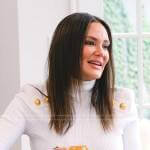 Meredith’s white turtleneck sweater with gold buttons on The Real Housewives of Salt Lake City