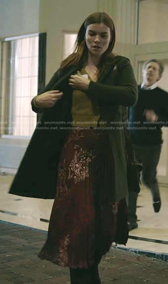 Cade’s red printed pleated skirt on The Resident
