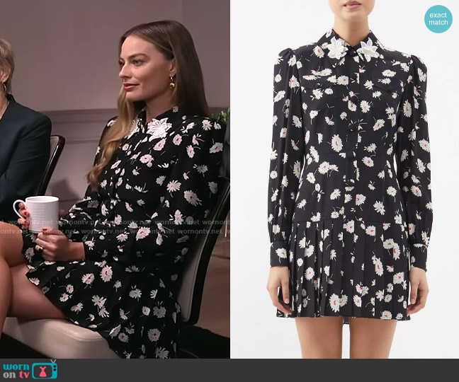Alessandra Rich Daisy-print pleated silk mini dress worn by Margot Robbie on CBS Mornings