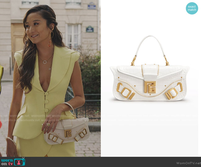 Balmain Blaze Croc-Embossed Pouch Crossbody Bag worn by Mindy Chen (Ashley Park) on Emily in Paris
