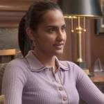 Bela’s purple polo top and plaid skirt on The Sex Lives of College Girls
