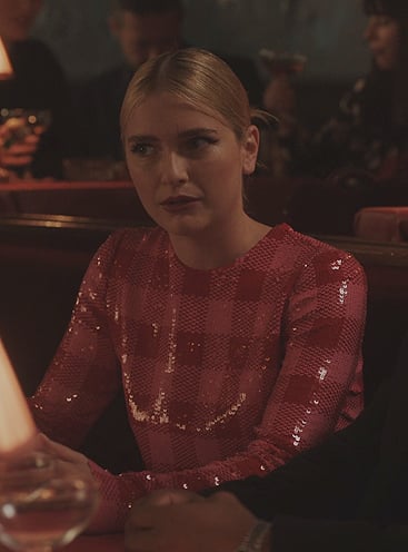 Camille’s pink latex check mini dress on Emily in Paris