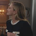 Camile’s contrast two-tone cardigan on Emily in Paris