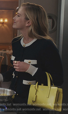 Camile’s contrast two-tone cardigan on Emily in Paris