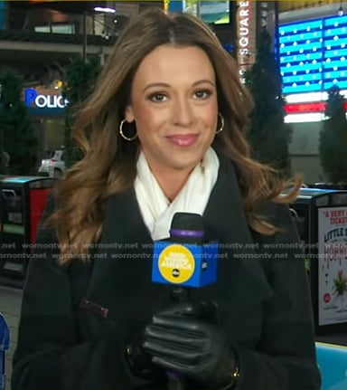 Cheryl Scott’s black striped wrap coat on Good Morning America