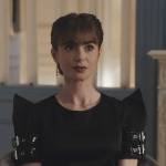 Emily’s black buckle sleeve mini dress on Emily in Paris