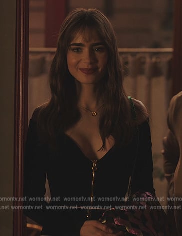Emily’s zip top and skirt on Emily in Paris
